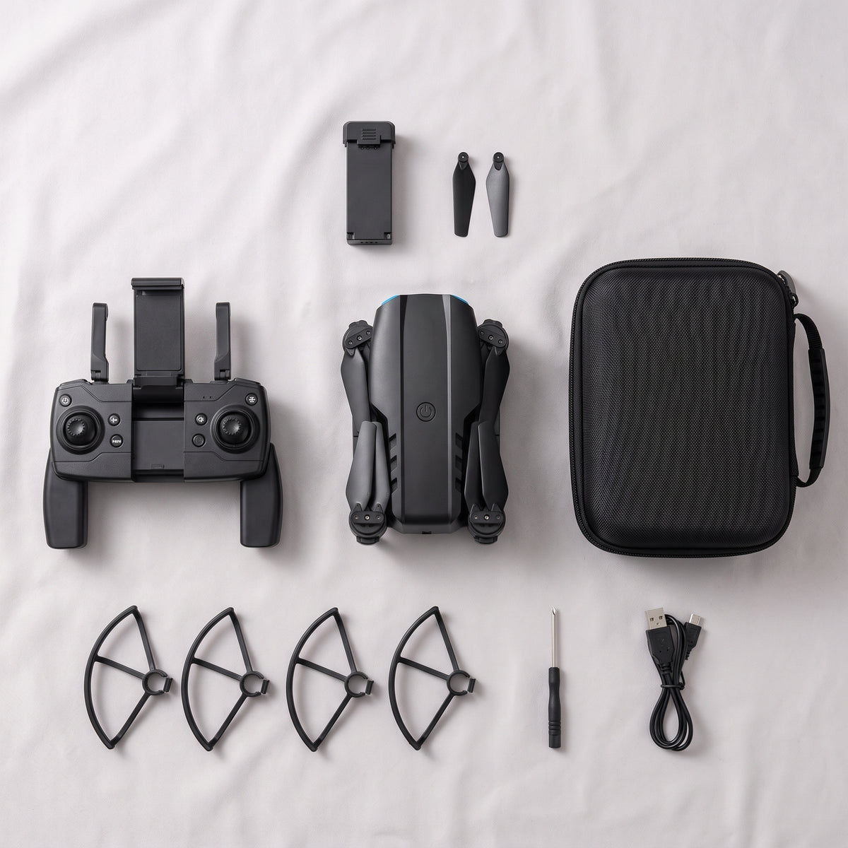 Black Skyline drone kit: remote, battery, propeller guards, spare blades and carry case
